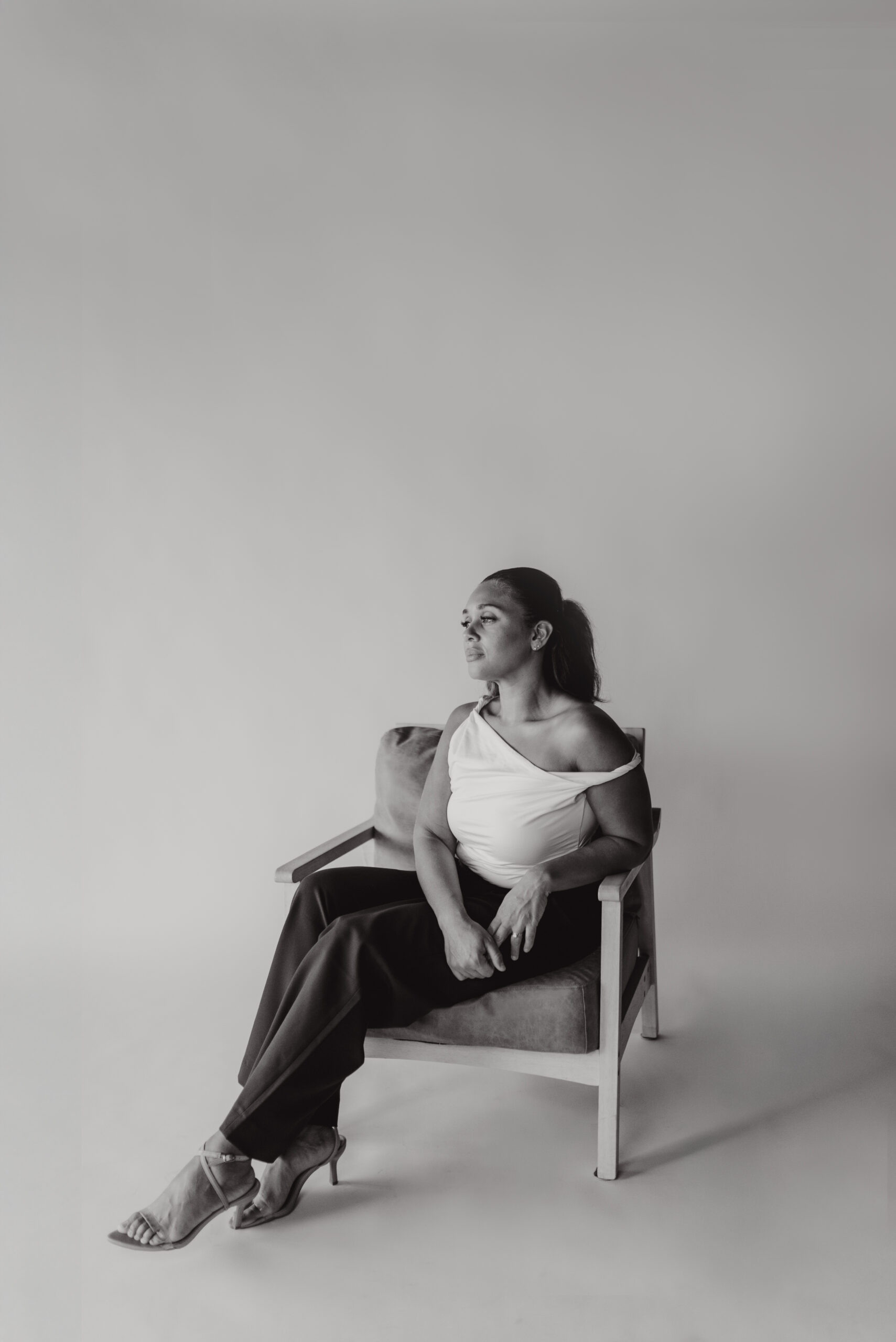 Black and white editorial portrait of the owner of Elever Aesthetics, during a brand photo session